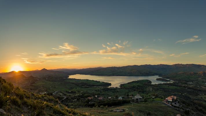 Sun rise over Pozzillo Lake, the lake below the town of Regalbuto