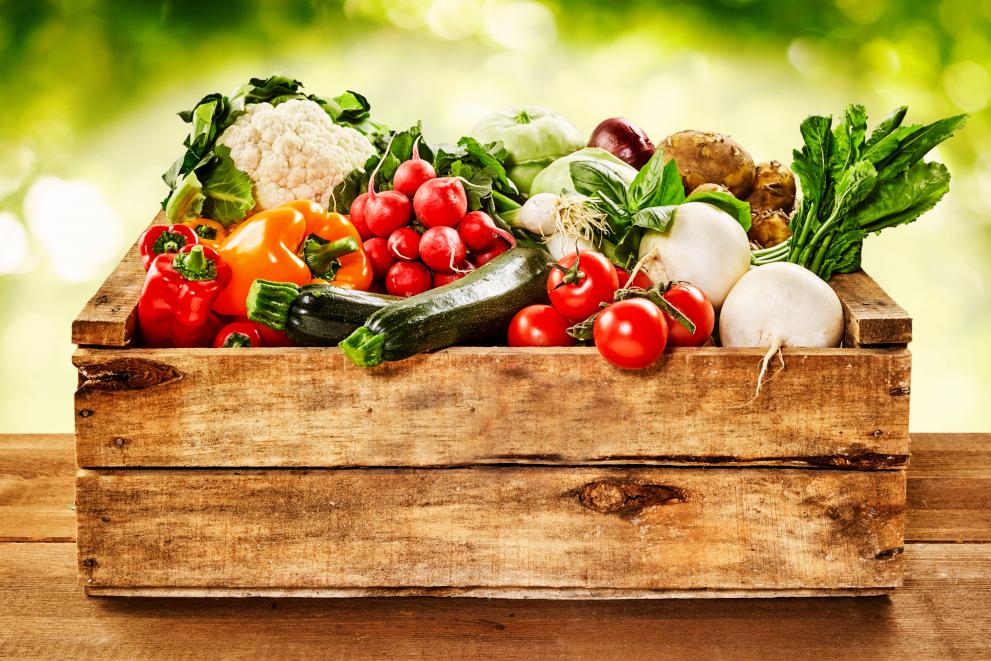 wooden_crate_of_farm_fresh_vegetables_c_adobestock_by_exclusive-design_1134980601.jpeg