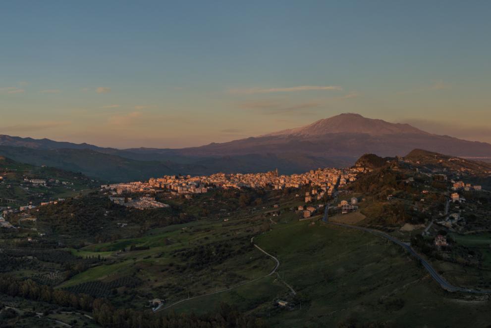 Panoramic view of Regalbuto city and its surroundings during sunset, Mount Etna in the background