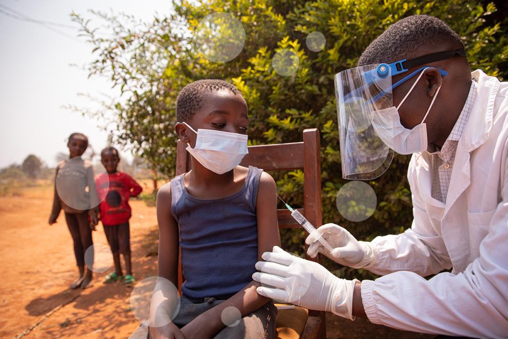 Open air vaccination session in an african village during corona virus pandemic
