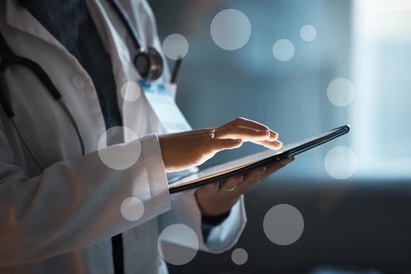 Digital tablet and doctor hands